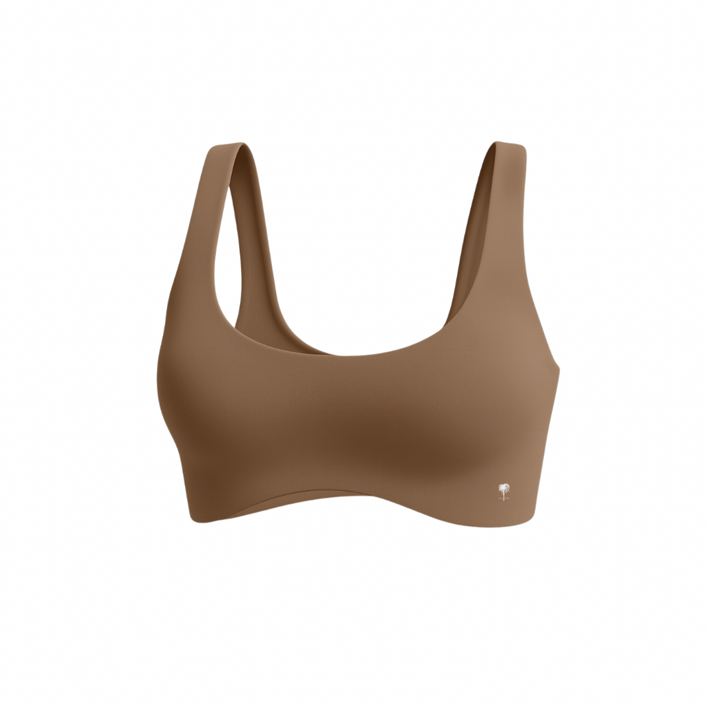 The Palm — SoftSculpt Bra in cocoa. Seamless second-skin fit with flattering neckline and wide straps for gentle support. Earthy, sculpted, and effortless.