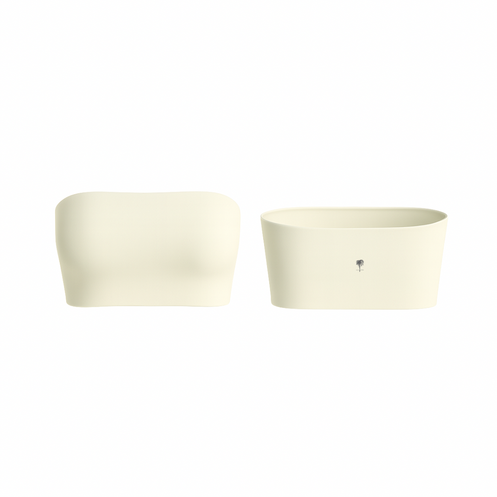 The Palm – SoftSculpt™ Strapless in beige. Minimalist strapless top crafted from seamless, soft-touch fabric with light stretch for a flattering, sculpted fit. Perfect for layering or wearing solo.