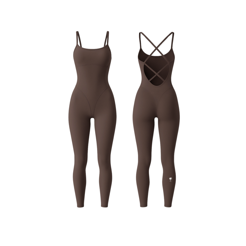 he Palm StrapSculpt™ Jumpsuit in rich mocha brown, featuring a contoured fit, sculpting seams, and criss-cross back straps. A sleek, body-hugging silhouette designed for everyday movement and elevated comfort.