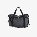 The Palm Urban Motion™ Weekender Bag in Charcoal Gray. Lightweight oversized duffel bag with spacious storage, comfortable carry handles, and a sleek minimalist design for gym sessions, travel, and everyday movement.