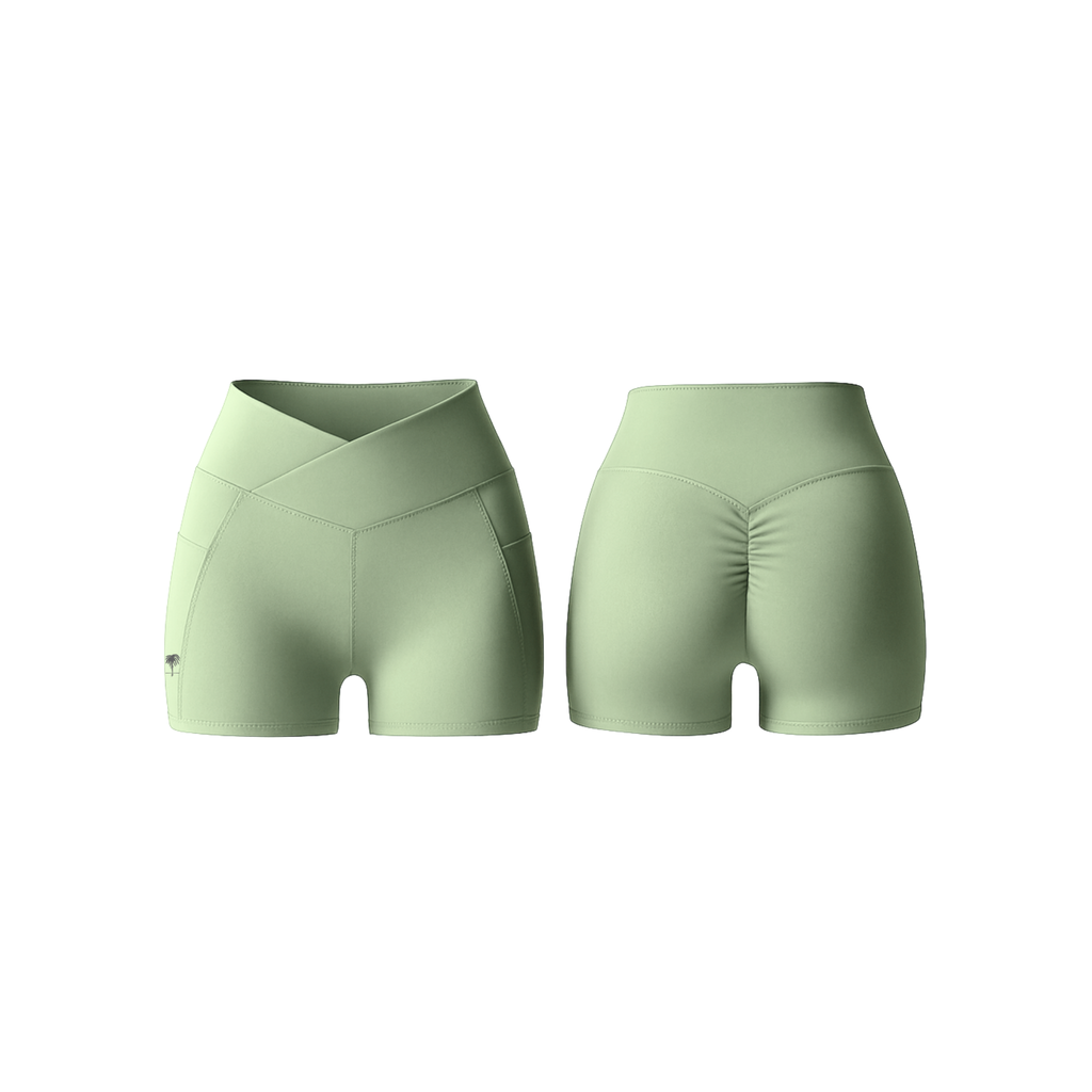 The Palm V-Waist™ Short in mint green, featuring a sculpting crossover waistband and smooth second-skin stretch fabric, shown from front and back
