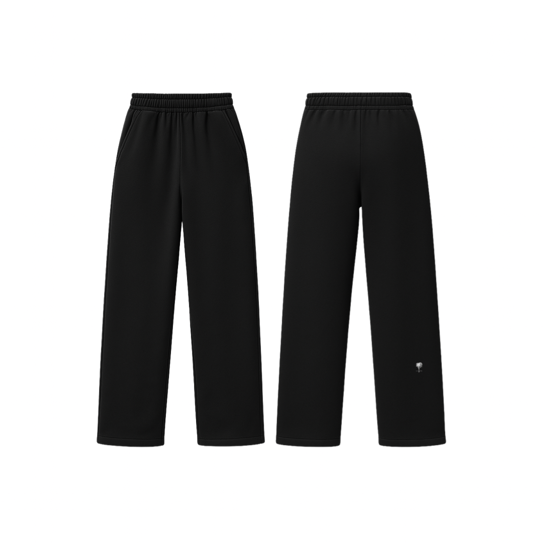 The Palm WarmFlex™ Pants in black — soft-touch wide-leg pants with an elastic waistband and relaxed silhouette, designed for warmth and everyday comfort. A clean, seamless look with subtle logo detailing.