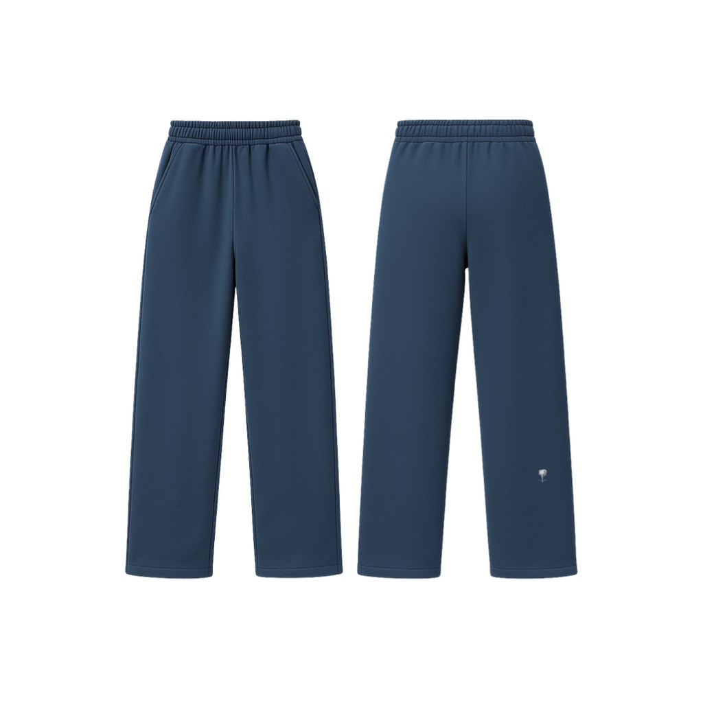 The Palm WarmFlex™ Pants in deep navy blue — soft-touch wide-leg pants with an elastic waistband and relaxed silhouette, designed for warmth and everyday comfort. A clean, seamless look with subtle logo detailing.