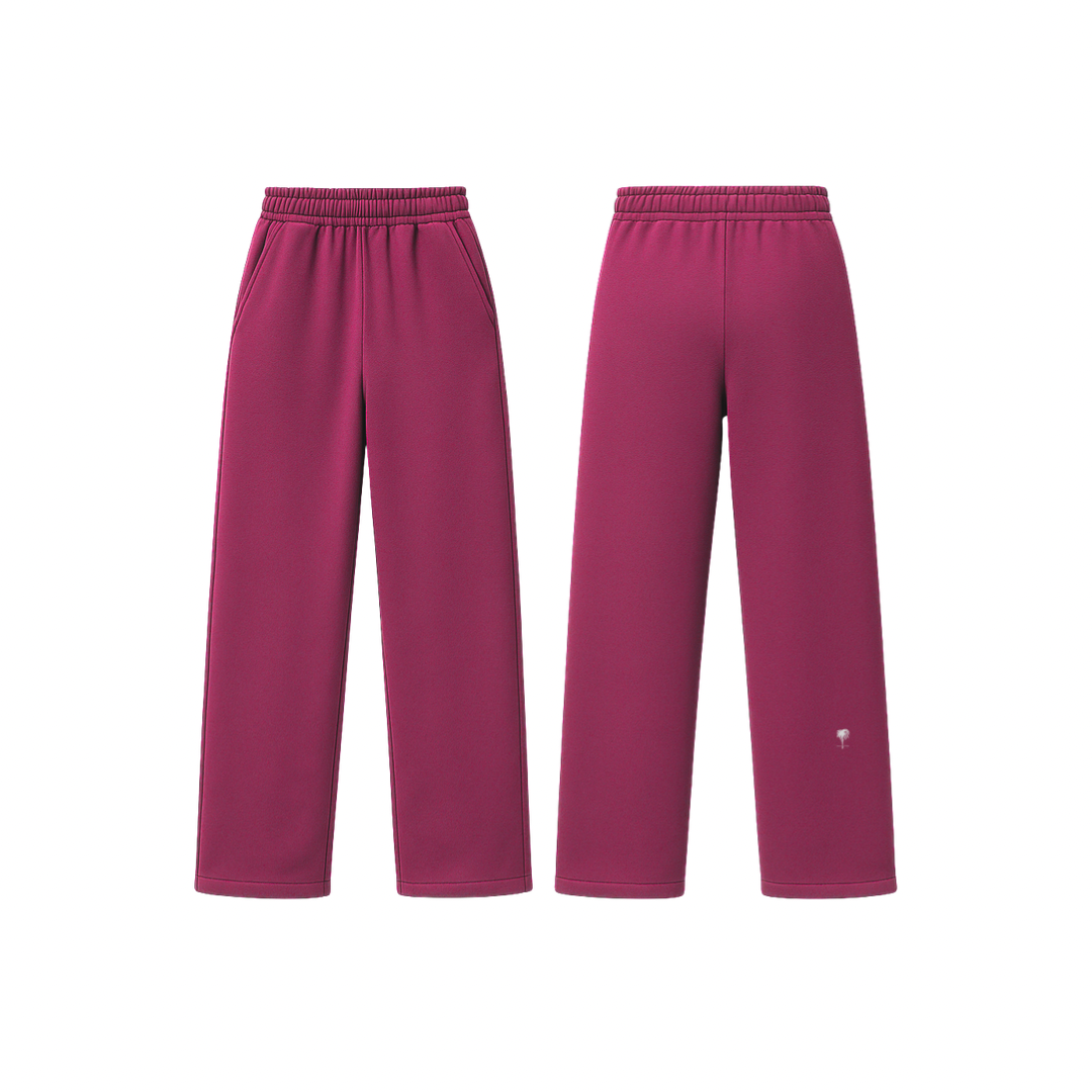 The Palm WarmFlex™ Pants in raspberry pink — soft-touch wide-leg pants with an elastic waistband and relaxed silhouette, designed for warmth and everyday comfort. A clean, seamless look with subtle logo detailing.