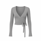 WrapLuxe™ Long Sleeve top in grey — elegant wrap design with tie closure, fitted silhouette, and minimal aesthetic on a white background
